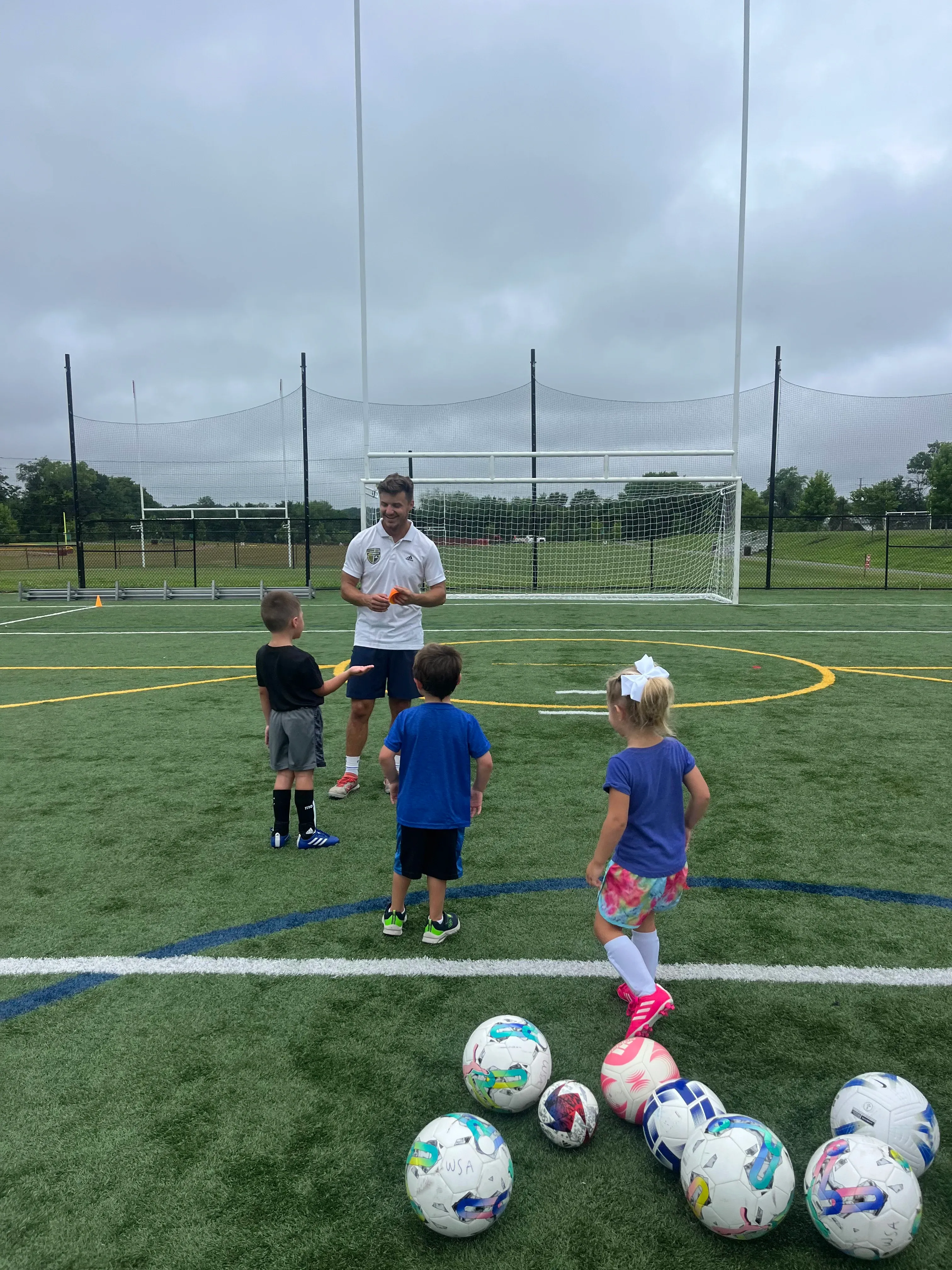 Children playing soccer at a summer camp in Warrenton